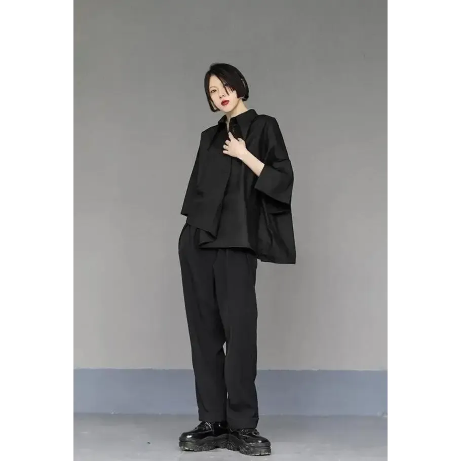 Black Shirt with Asymmetrical Design and Mid-Length Sleeves