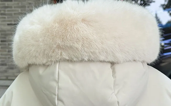 Calf-Length Insulated Parka for Women with Relaxed Fit and Windproof Features